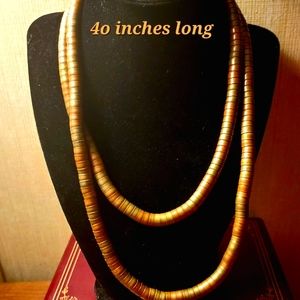 Vintage Snake chain, I believe it is brass. 40 inches long.